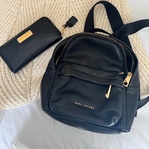 Marc Jacob’s back pack and wallet set.